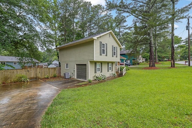 5461 Forest Path Ct, Stone Mountain, GA 30088 - view of property exterior featuring concrete driveway, central AC, and an attached garage