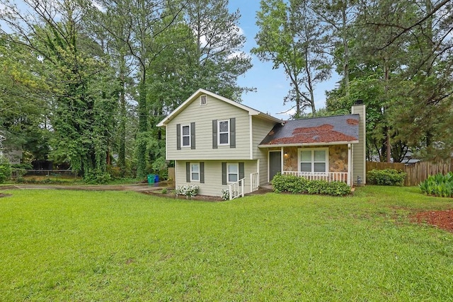 5461 Forest Path Ct, Stone Mountain, GA 30088 - split level home featuring a chimney and a porch