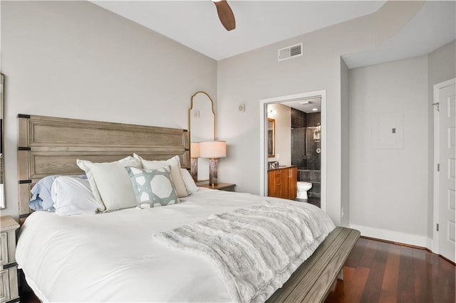 bedroom featuring baseboards, visible vents, connected bathroom, ceiling fan, and wood finished floors