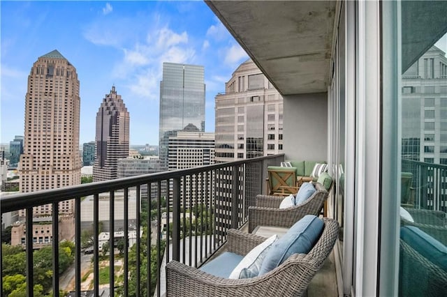 balcony featuring a city view