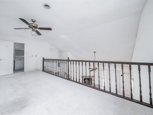 904 Bridge Ln SE, Smyrna, GA 30082 - additional living space with ceiling fan, lofted ceiling, and carpet