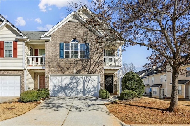 view of front of property with a balcony and a garage