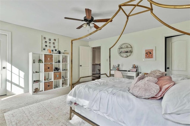 bedroom with carpet floors and a ceiling fan