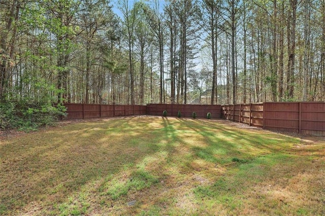view of yard featuring a fenced backyard