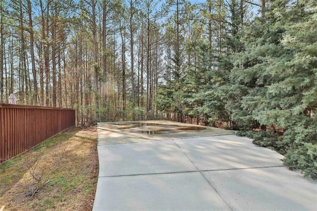 view of street with a wooded view