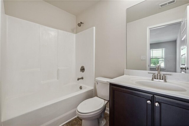 bathroom featuring toilet, visible vents, shower / washtub combination, and vanity