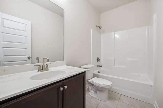 full bath with vanity, tile patterned flooring, toilet, and  shower combination