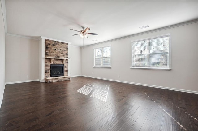 unfurnished living room featuring ornamental molding, a ceiling fan, dark wood-type flooring, and visible vents
