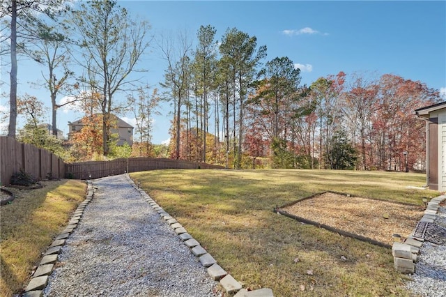 view of yard with fence