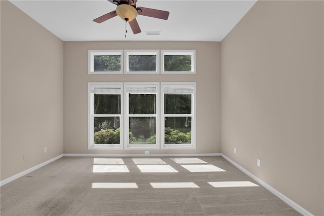 5040 Stonehaven Vw, Cumming, GA 30040 - empty room featuring carpet flooring, baseboards, and a ceiling fan
