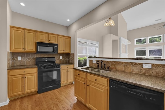 5040 Stonehaven Vw, Cumming, GA 30040 - kitchen featuring black appliances, a sink, healthy amount of natural light, backsplash, and recessed lighting