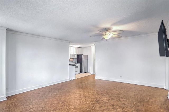 unfurnished living room featuring ceiling fan, a textured ceiling, and light parquet flooring