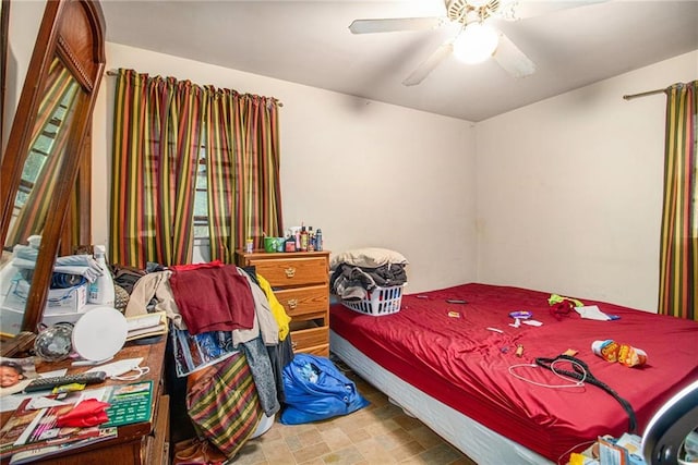 bedroom featuring ceiling fan