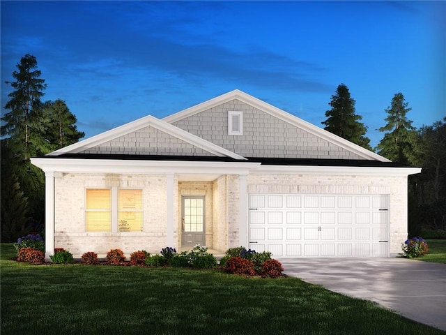view of front of house with a garage, a front yard, brick siding, and driveway