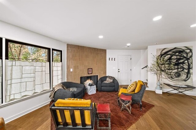 595 Overbrook Dr NW, Atlanta, GA 30318 - living area featuring wood finished floors, recessed lighting, a fireplace, and baseboards