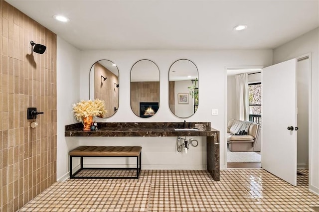 595 Overbrook Dr NW, Atlanta, GA 30318 - full bathroom featuring a tile shower, recessed lighting, and a sink