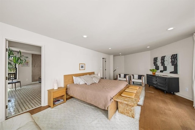595 Overbrook Dr NW, Atlanta, GA 30318 - bedroom with light wood-style floors, recessed lighting, and baseboards