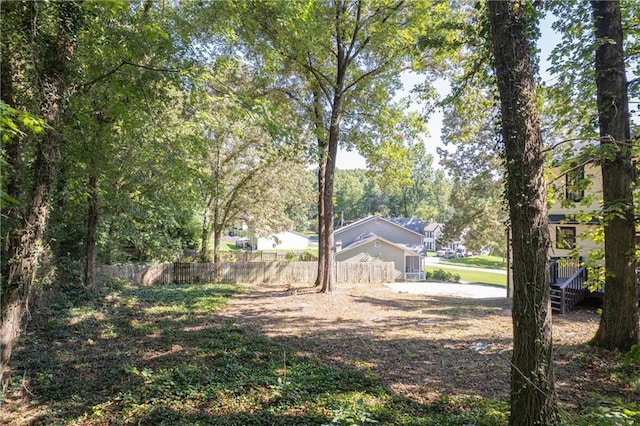 view of yard with fence