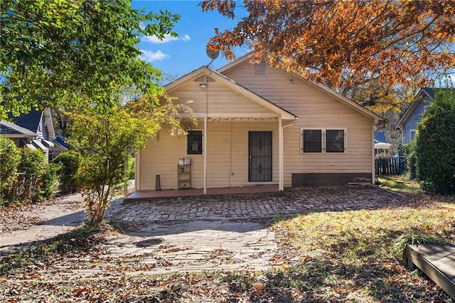 view of front of property featuring a patio area