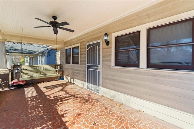 view of patio with ceiling fan