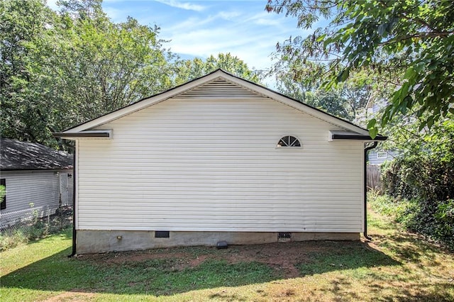 view of property exterior featuring a yard