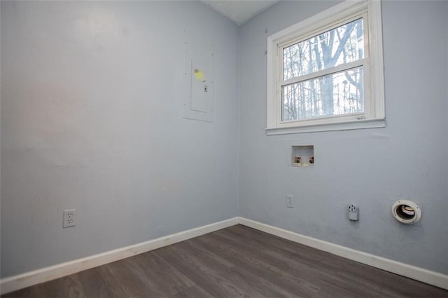 laundry room with dark wood-type flooring, washer hookup, and electric panel