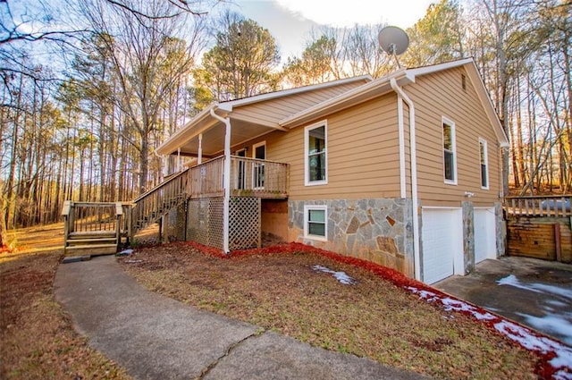 view of side of property featuring a garage