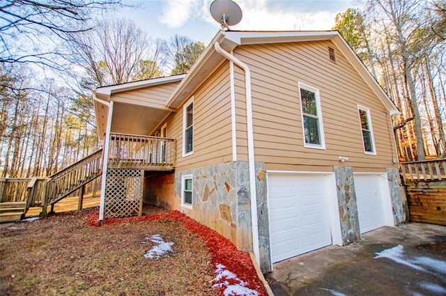 view of property exterior featuring a garage