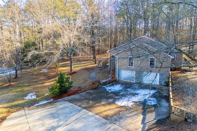 view of yard with a garage