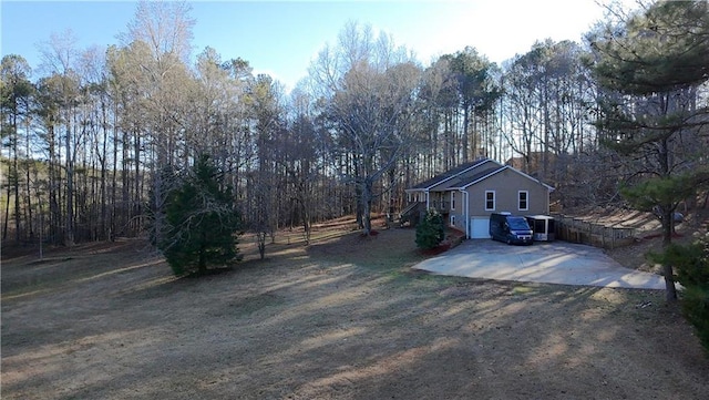 view of yard with a garage