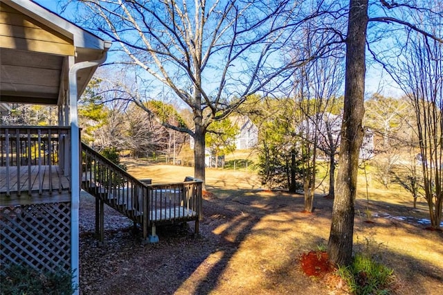 view of yard featuring a deck