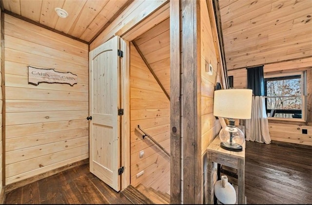 detailed view of wooden walls, wooden ceiling, and wood finished floors