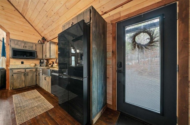 kitchen featuring wood ceiling, lofted ceiling, light countertops, dark wood-style flooring, and wooden walls