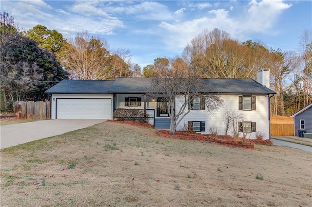 ranch-style house with concrete driveway, fence, a chimney, and an attached garage