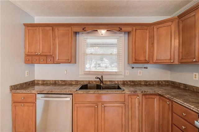 kitchen with a textured ceiling, stainless steel dishwasher, brown cabinetry, and a sink