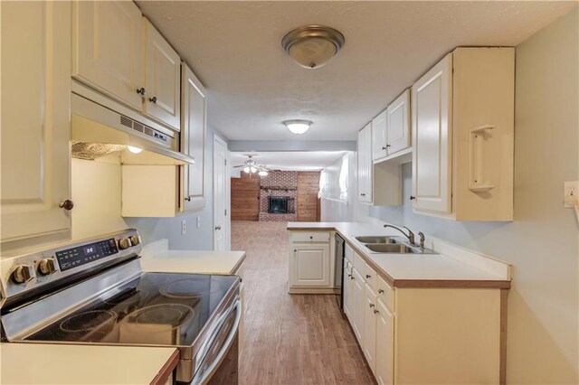 empty room featuring ornamental molding, dark wood-style flooring, a textured ceiling, and baseboards