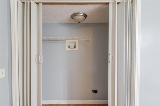 unfurnished room featuring carpet, a paneled ceiling, and baseboards