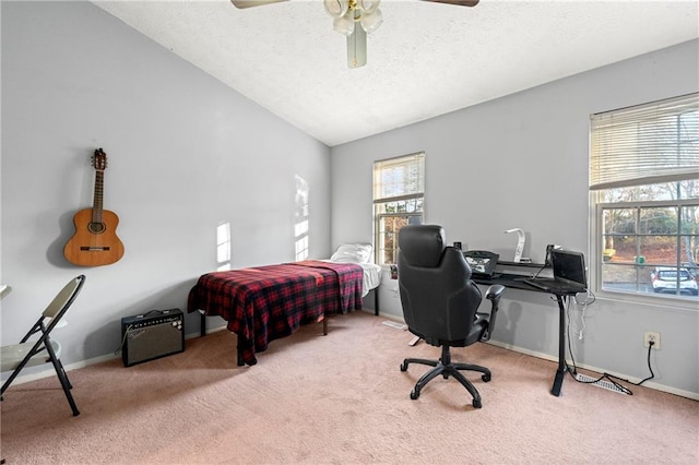 carpeted bedroom featuring a textured ceiling, ceiling fan, and lofted ceiling