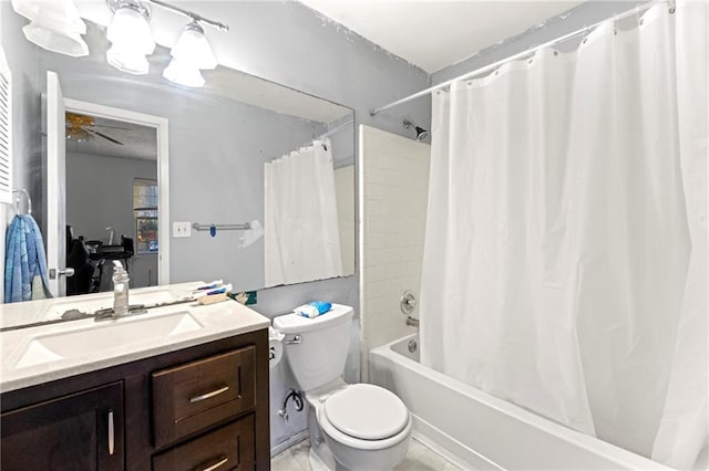 full bathroom featuring shower / tub combo, vanity, toilet, and ceiling fan