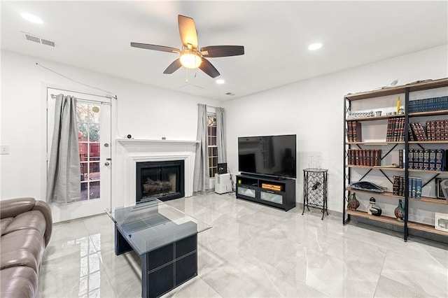 living room with ceiling fan