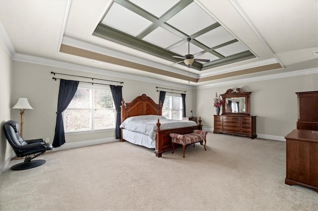 bedroom featuring ceiling fan, ornamental molding, light carpet, and a tray ceiling