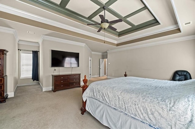 carpeted bedroom with ceiling fan, crown molding, and a tray ceiling