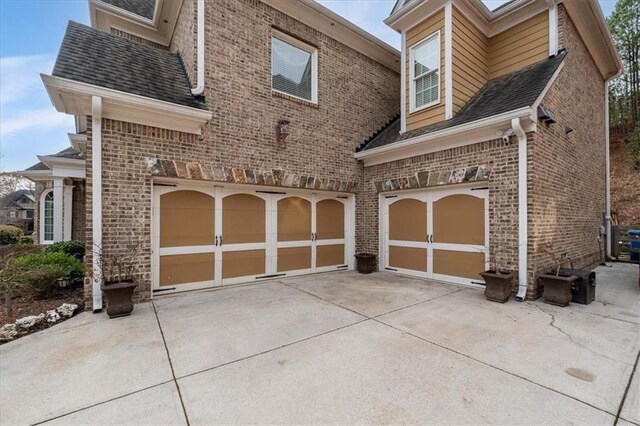 view of property exterior featuring a garage