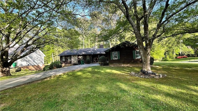 ranch-style house with a front yard