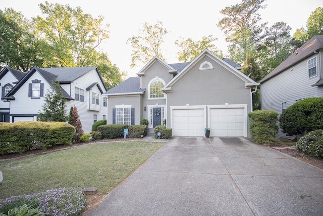 2019 Chelton Way SE, Smyrna, GA 30080 - view of front of property with a front yard, an attached garage, concrete driveway, and stucco siding