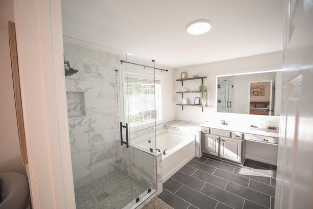 2019 Chelton Way SE, Smyrna, GA 30080 - full bath featuring a bath, tile patterned floors, vanity, and a marble finish shower