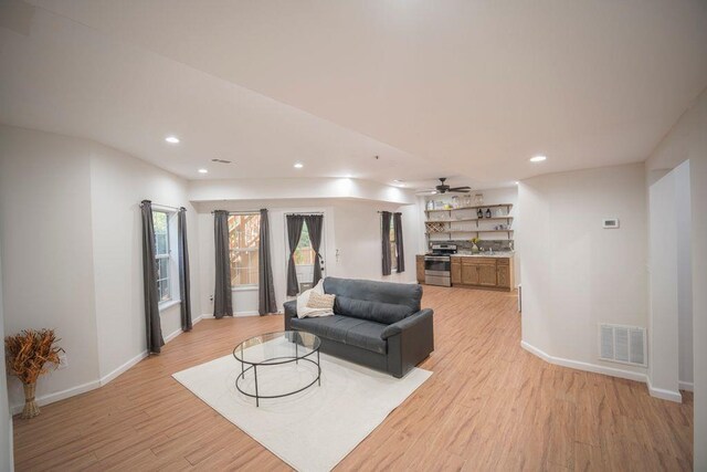 2019 Chelton Way SE, Smyrna, GA 30080 - living area with recessed lighting, light wood-style flooring, visible vents, and baseboards