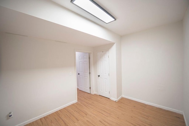 2019 Chelton Way SE, Smyrna, GA 30080 - spare room featuring light wood-style floors and baseboards