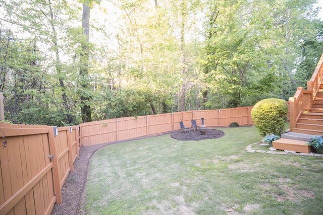 2019 Chelton Way SE, Smyrna, GA 30080 - view of yard with stairway and a fenced backyard