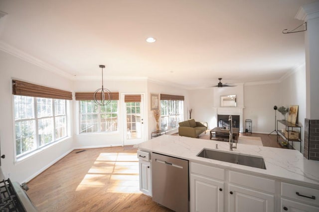 2019 Chelton Way SE, Smyrna, GA 30080 - kitchen with a sink, plenty of natural light, white cabinetry, ceiling fan, and dishwasher